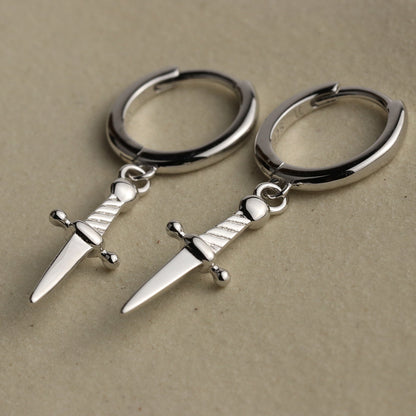 Mini daggers hoop earrings in sterling silver with a snap close.